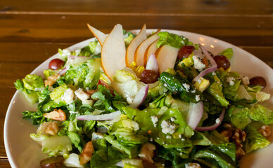  Chicken Sandwich on White Plate with Napkin and Wood Background