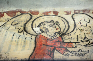 Angel sobre pared en Brujas, Bélgica