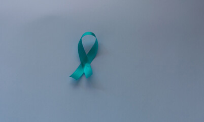 colorful ribbons on light blue background, cancer awareness, world cancer day, national cancer survivor day, world autism awareness day