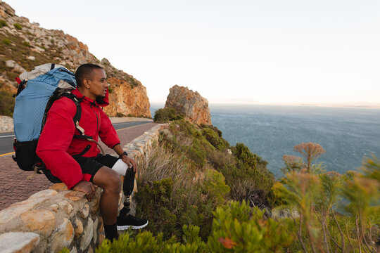 Black African American Male athlete with prosthetic leg - Powered by Adobe