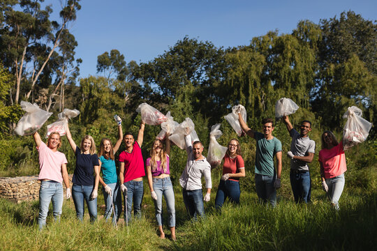 Volunteers cleaning up river in the countryside