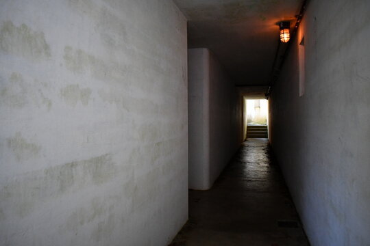 Dark bunker hallway.