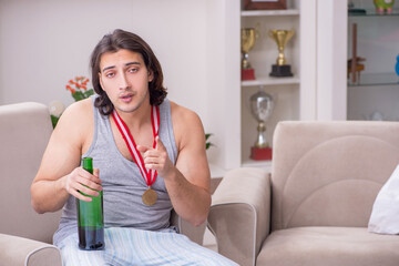 Man ex-champion suffering from alcoholism at home