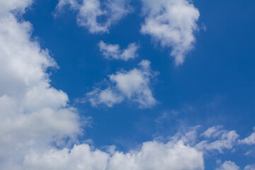 Naklejka na ściany i meble Clear blue sky with beautiful cloudscape, white clouds nature background