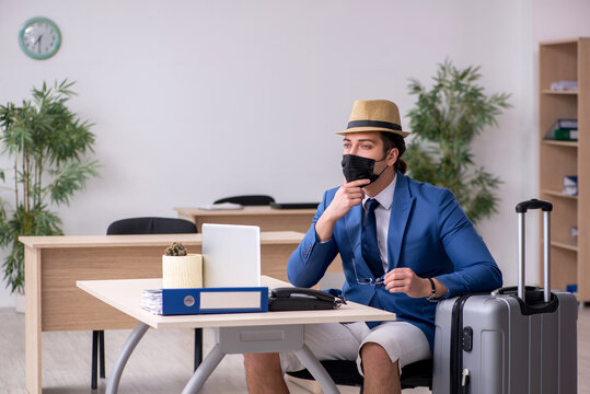 Businessman Preparing For Trip During Pandemic