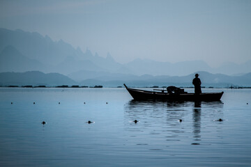 Fishermen working in Guanabara Bay, Rio de Janeiro, Brazil