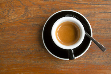 Black coffee on a wooden table