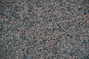 red granite stone background texture with stone and quartz for a unique blend pattern