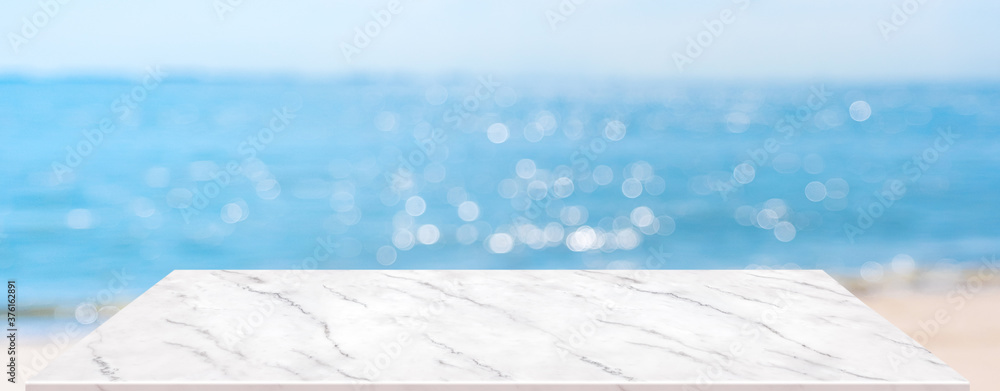Aufkleber summer background.empty perspective marble table with blur sea and sky bokeh background, banner mock