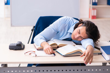 Young businessman student studying at workplace