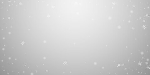 Sparse glowing snow Christmas background. Subtle f