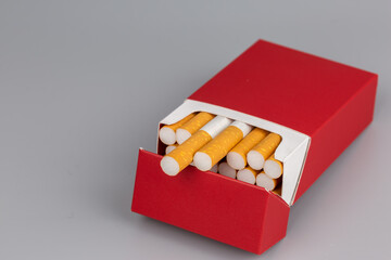 Close up cigarette in pack is addictive to be cancer.smoking reduction campaign in World No Tobacco Day.