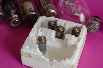 Group of random radio tubes close up.