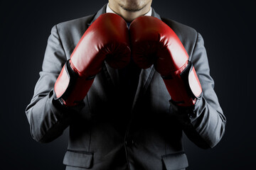 businessman with red boxing gloves