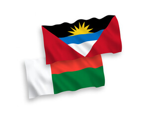 Flags of Antigua and Barbuda and Madagascar on a white background