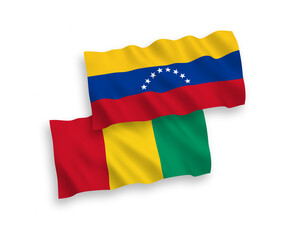 Fototapeta premium Flags of Venezuela and Guinea on a white background