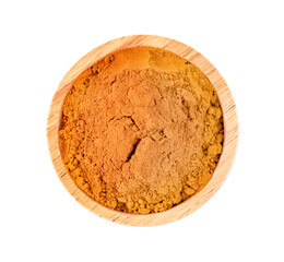 Dry turmeric powder or curcuma longa linn in wooden bowl isolated on white background