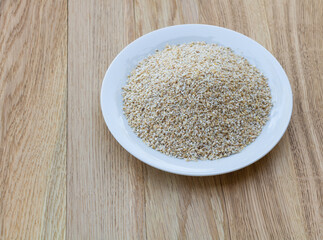 Cereal grains groats in a plate, natural organic food