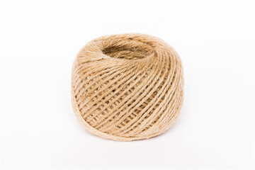 Skein of jute twine isolated on white background.