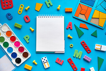 School supplies, stationery on blue background space for caption. Back to school concept. School, education and learning concept. creativity for kids. Top view colorful background. Flat lay