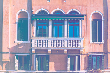 Fototapeta na wymiar Italian culture on Venetian facades.