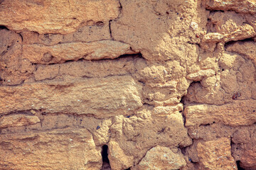Stone and clay masonry . Ancient wall background 