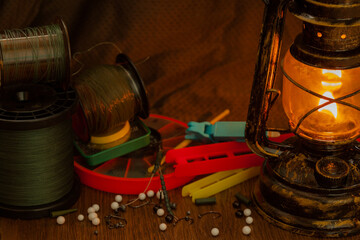 fishing equipment and antique kerosene lamp
