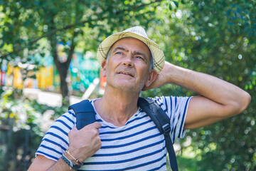 Obraz premium tourist with backpack walking through the countryside