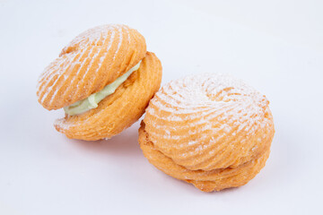 fresh pastry with filling, isolated on a white background