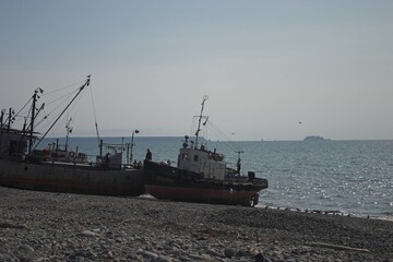 old fishing boats on the shore