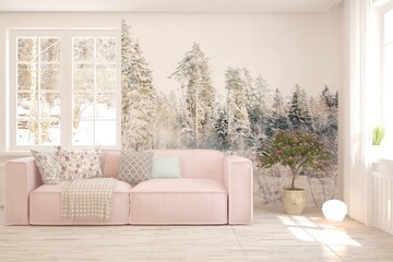 White living room with sofa and winter landscape in window. Scandinavian interior design. 3D illustration