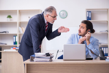 Two employees in the office