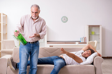 Fototapeta premium Man with drinking problem and the family