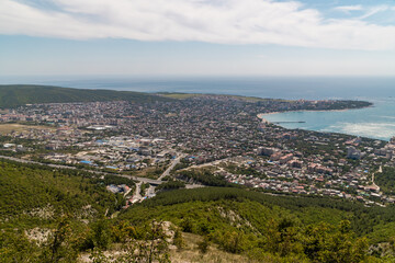 Fototapeta na wymiar View of Gelendzhik Bay from the height of the Markhotsky ridge in summer.