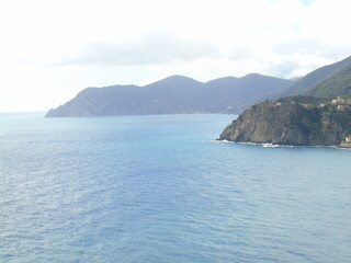 Cinque Terre, Italy - 08/31/2020: Beautiful landscape of a coastal fishing village, amazing view on many little colorful houses, traditional architecture of the little Italian town called Cinque Terre