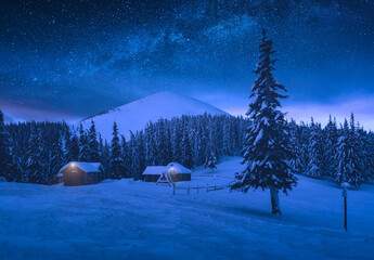 Mountain village in high mountain valley under the starry sky