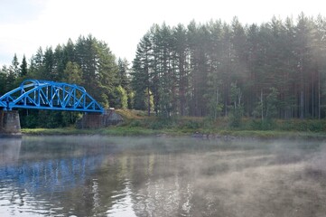 A foggy morning near a river early september in the Vansbro kommun in Dalarna,Sweden.
