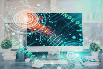 Double exposure of table with computer on background and data theme hologram. Data technology concept.