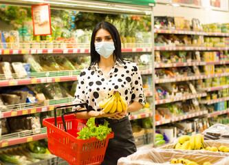 young woman shopping in a supermarket