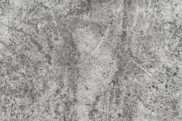 The bare cement wall background can be used as a design background.