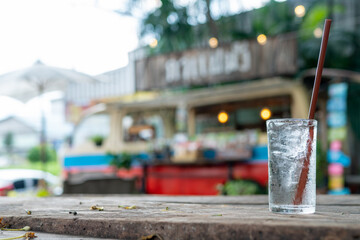 Cold drinking water in the shade of the wind blowing wood