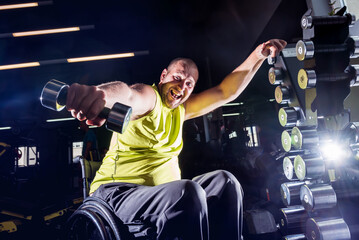 Disabled man training in the gym of rehabilitation center