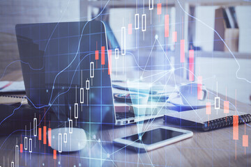 Financial market graph hologram and personal computer on background. Double exposure. Concept of forex.