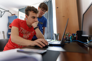 Students couple working online
