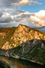 Mountain landscape sunset with river and clouds - Parque Enciña da Lastra, Galicia