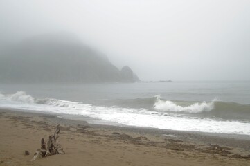 thick morning fog on the seashore
