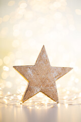Christmas bokeh background with decorative star.