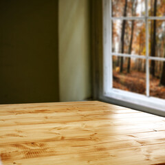 desk of free space and blurred window 