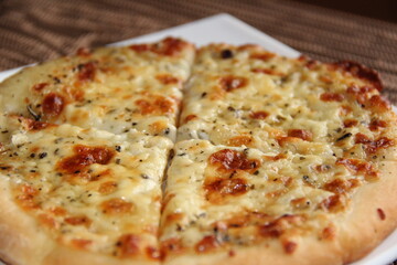 Juicy freshly cooked Italian pizza from the oven