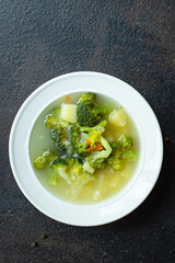 soup broccoli vegetables first course broth serving size natural product vegetarian no meat top view place for text copy space keto or paleo diet